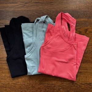3 Lululemon Nulu racerback tank tops - women’s size 10